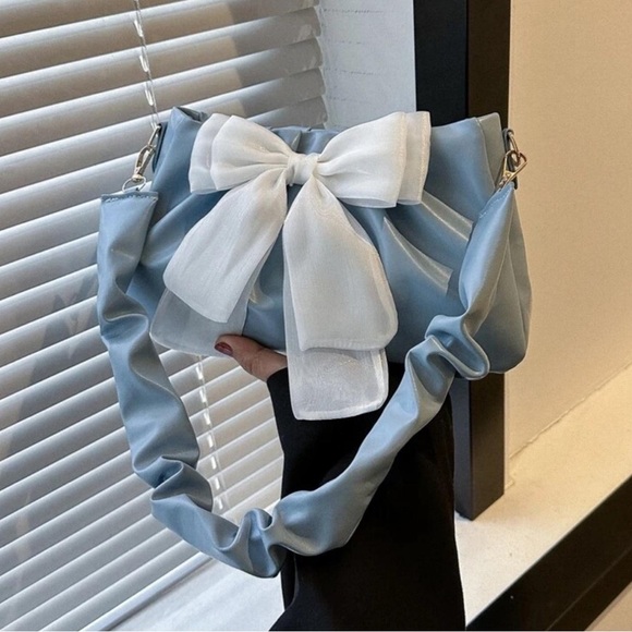Cider Handbags - Light blue faux leather shoulder bag / crossbody with large bow detail | NWT